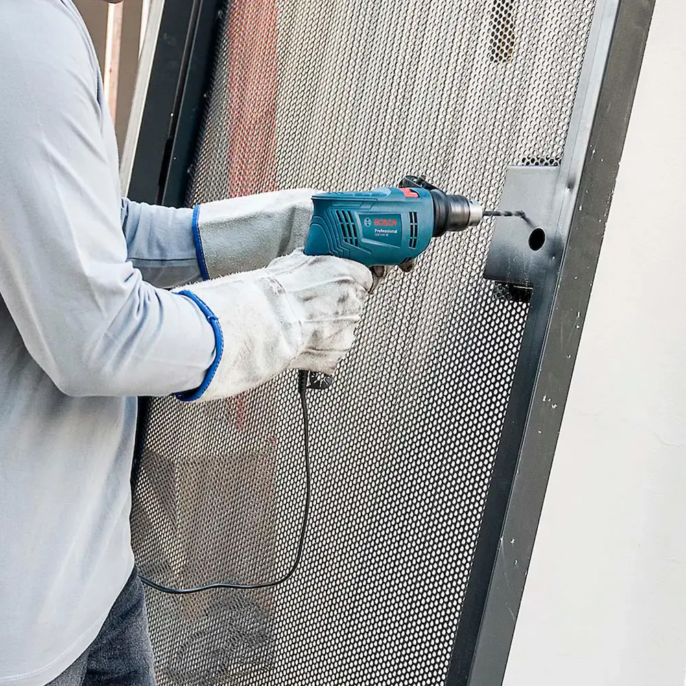 Furadeira de impacto Bosch GSB 550 550W 127V 14 acessórios 220 V — fotografia 6
