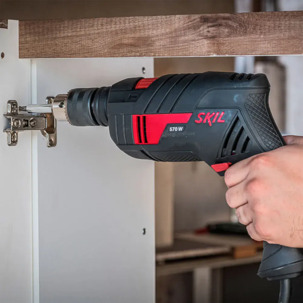 Furadeira de impacto com 14 brocas 1/2” 2800RPM 570W 220V Skil — fotografia 9