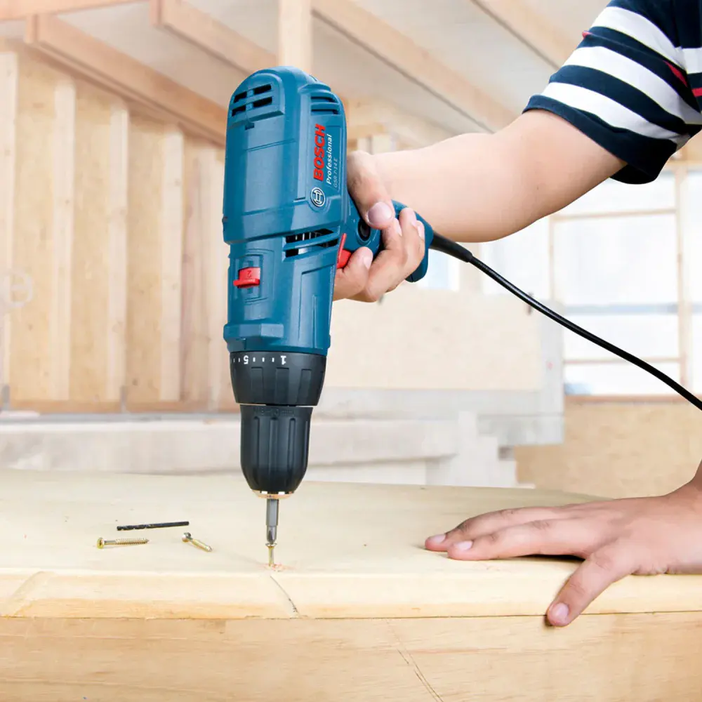 Parafusadeira furadeira GSR7-14E 220V + 21 bit Bosch — fotografia 4