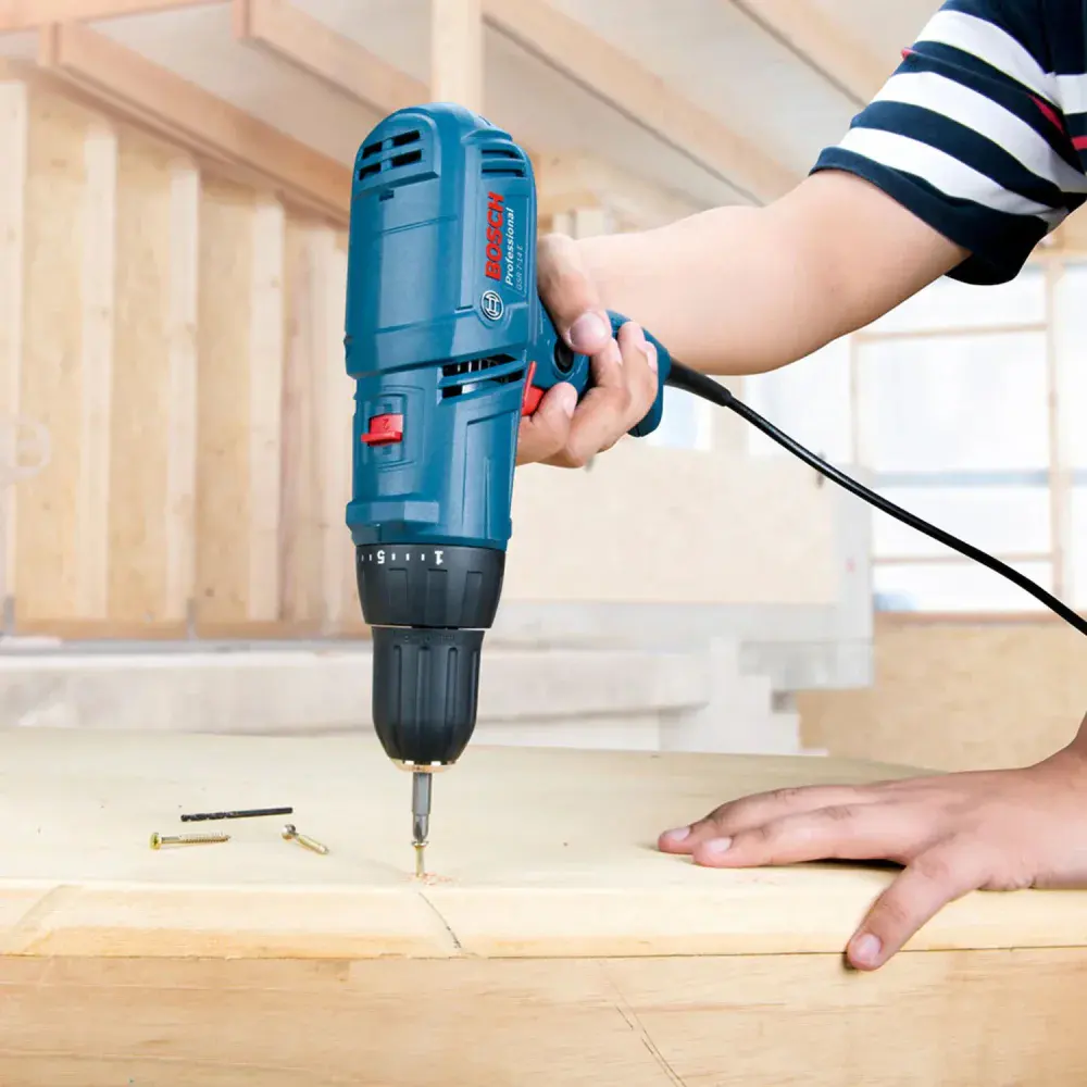 Parafusadeira furadeira GSR7-14E 220V + 21 bit Bosch — fotografia 9